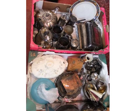 Two boxes containing a large collection of silver plated items to include tankards, tea pots etc; together with a metronome, 