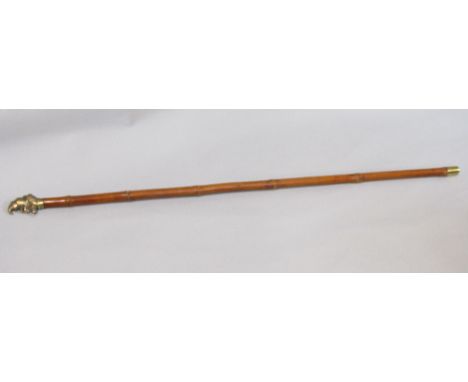 Bamboo shafted sword stick, the cast metal knop in the form of Mr Punch