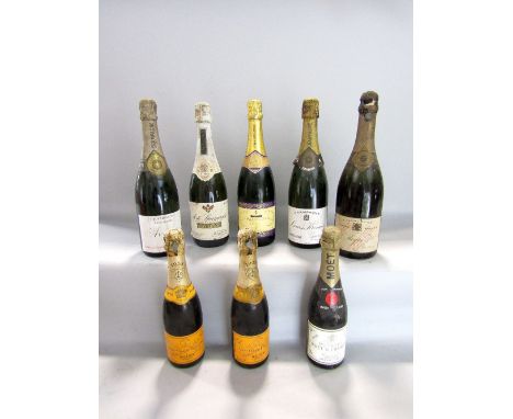 Eight vintage bottles of champagne to include 1955 Moet &amp; Chandon, two Louis Kramer White Label champagne, three 1955 Veu