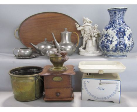 A German beechwood and brass coffee grinder, a set of Lyssex two kilo kitchen scales, a pewter tea service in the art nouveau