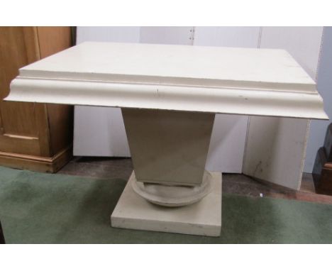 A pair of classical console or centre tables, each of rectangular form raised on a square tapering pillar and platform base, 