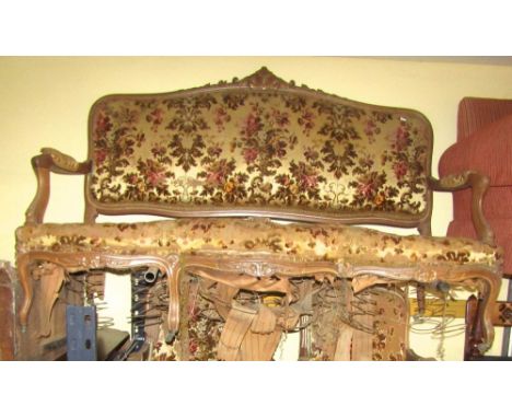 An extensive late 19th century French salon suite comprising a sofa, six armchairs and four single chairs all with carved and