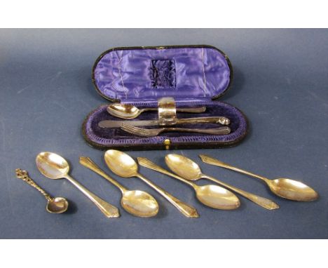 Cased silver knife, fork, spoon and napkin ring christening set together with a further set of six fancy silver teaspoons and