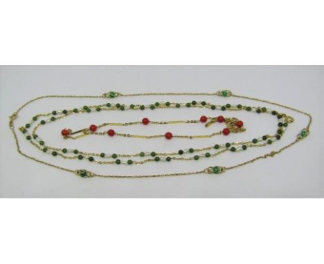 Three gold necklaces each interspersed with beads; a long 18ct example with baroque pearls and jade type beads, a 9ct example