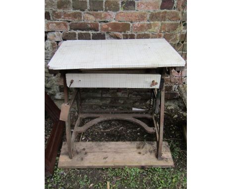 A two to three seat garden bench with slatted seat raised on decorative cast iron ends and panelled back, together with a vin