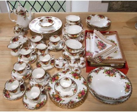 An extensive collection of Royal Albert Old Country Roses pattern dinnerwares including an oval and a circular serving dish, 