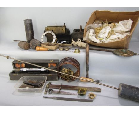 Collection of clock and watch makers workshop spares to include movements, decorations, tools, etc
