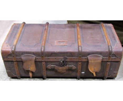 A good 19th century canvas travelling trunk with timber bands, leather fittings and brass lock plate of French manufacture