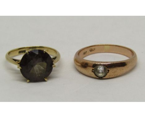 Two 9ct dress rings; one set with alexandrite, size K, the other with a white spinel, size P, 6.4g total (alexandrite purple 