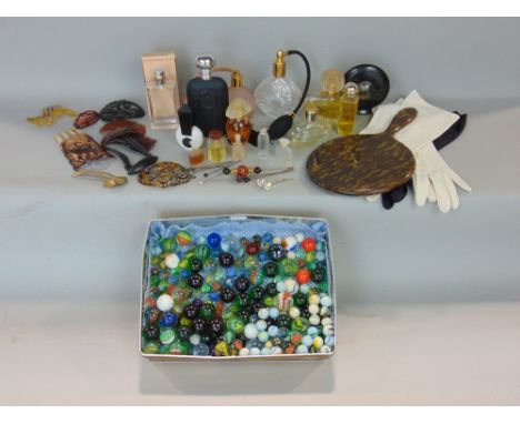 Miscellaneous effects to include a large collection of vintage marbles, hair pieces, perfume bottles and accessories 