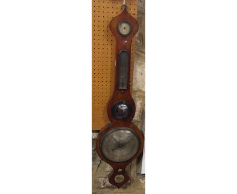 Walnut barometer thermometer by Knight &amp; Son of Northampton, with silvered dials, 95 cm high