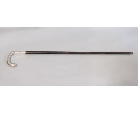 Ebonised Malacca shafted walking stick with silver crook handle, of Dutch original with inscription