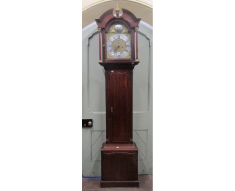 A Georgian longcase clock, the hood with column supports enclosing a broken arch brass dial with silvered chapter ring and ap