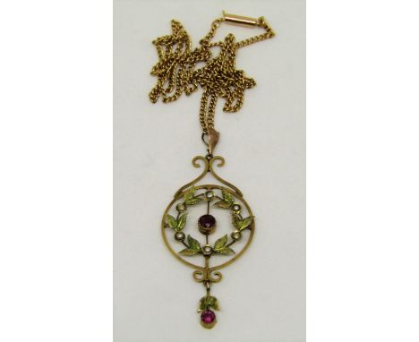 Art nouveau style garnet and seed pearl drop pendant with laurel surround, indistinctly marked to reverse, hung on an associa