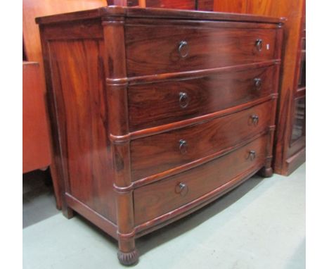 A contemporary hardwood bedroom chest in the Regency style, the shallow bow front fitted with four long drawers flanked by pa