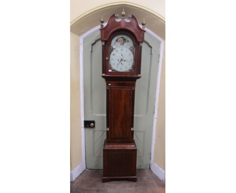 A Regency mahogany longcase clock with reeded and canted column corners, the case with flame veneers, the hood with further r