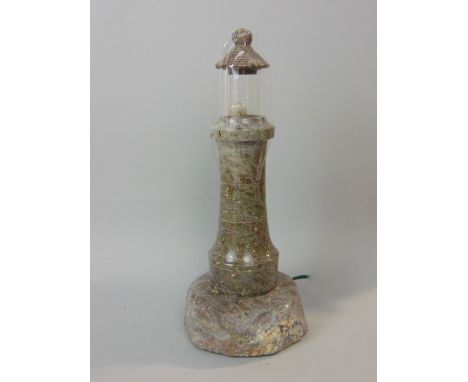 Carved serpentine novelty table lamp in the form of a lighthouse, 32 cm high