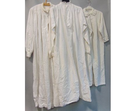 Collection of vintage textiles including antique white cotton nightgowns, christening gown, waist petticoat, table linen with