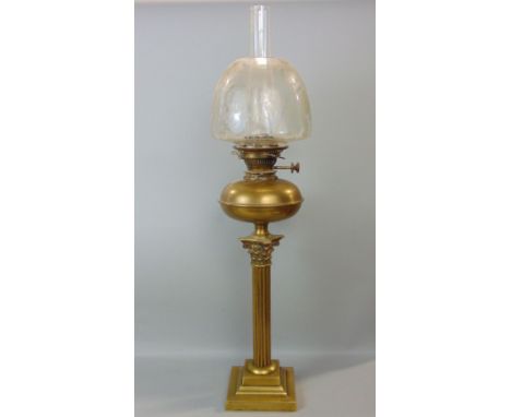 Good quality brass Corinthian column oil lamp, with stepped square base and original etched glass shade, the lamp 53cm high