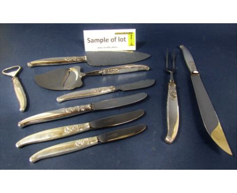 Collection of Mylius of Norway flatware comprising 16 table knives, 8 dessert knives, 8 cake knives, serving knife and fork, 