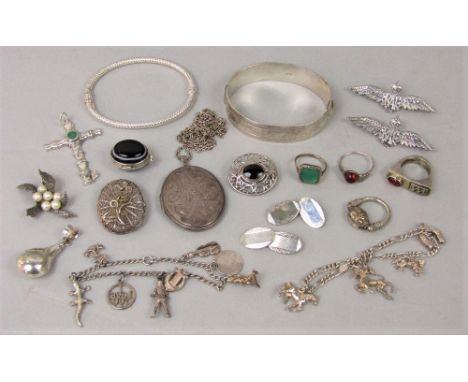 Interesting lot of silver / white metal costume jewellery to include a scarab beetle swivel ring, snuff pendant, pair of RAF 