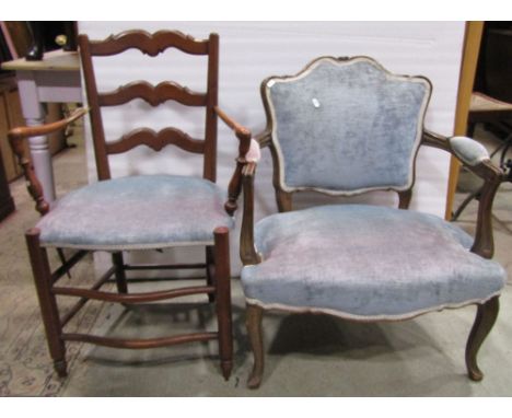 A French open armchair with carved and moulded detail, upholstered seat and back, a further provincial French ladderback elbo