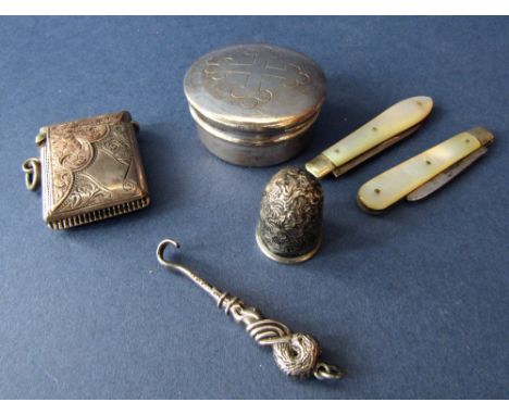 Mixed bijouterie silver lot to include silver and 9ct vesta case, novelty silver button hook mounted by a crane, two mother o