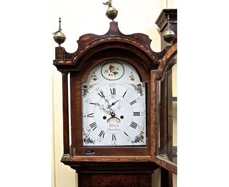 Georgian oak countrymade longcase clock with full length door, enclosing a 30cm broken arch painted dial, the spandrels with 