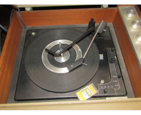 A vintage Ferguson solid state mains record player, model number 042, together with a further Ferguson boxed speaker amplifie
