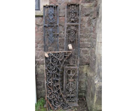 Two sections of 19th century cast iron railing with pierced anthemion and further detail, together with three arched sections
