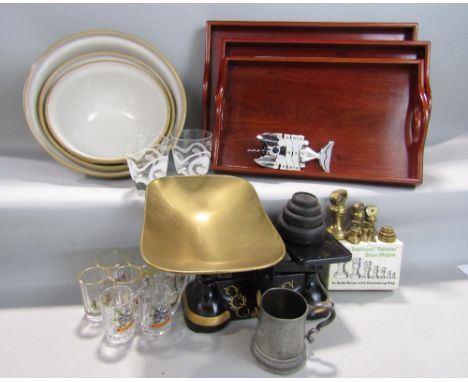 A mixed lot to include a graduated set of weighing scales, graduated set of hardwood trays, various drinking glasses and mixi
