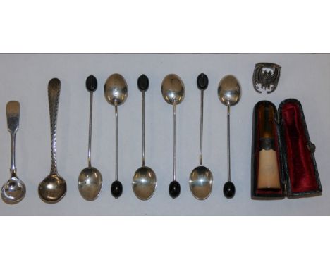 A set of six silver coffee bean spoons, Birmingham 1924, two silver salt spoons, a ring and a cheroot holder