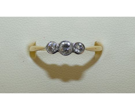 An 18ct gold three stone diamond ring collect set with old cut brilliants, approx 0.40 cts, weight 4g, size Q1/2