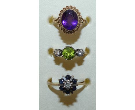 A 9ct gold amethyst dress ring, a sapphire and diamond cluster ring and another dress ring, weight 7g (3)