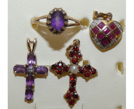 A 9ct gold garnet and pearl cross pendant, an amethyst cross pendant, a ruby and diamond heart pendant and a ring, gross weig