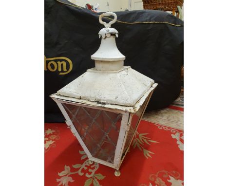 A white painted copper garden lantern, glass panels AF and in need of an overhaul, height 86 cm.