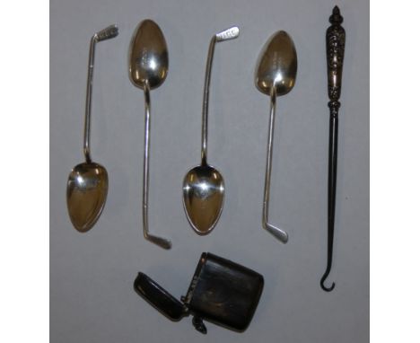 A set of four silver golf club teaspoons, Sheffield 1923, a silver vesta case and button hook