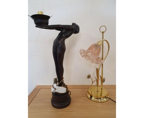 A black resin table lamp in the form of an Art Deco ball girl, lacking shade, height 54 cm and another lamp (2).