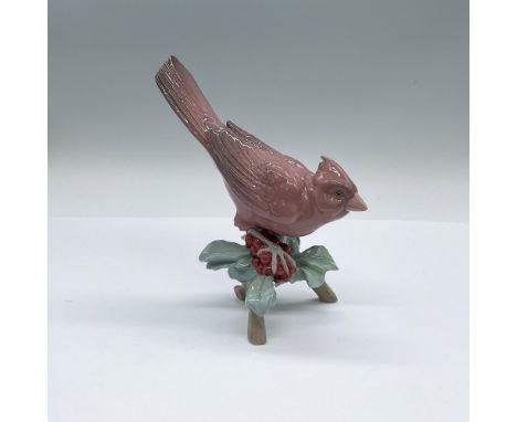 Glossy figure of a red cardinal perched on a holly branch. Lladro backstamp. Artist: Miguel Angel SantaeulaliaIssued: 2005-20