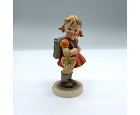 Hand-painted figurine depicting a young girl with a backpack and basket. Goebel backstamp on the bottom. Dimensions: 2"L x 2"