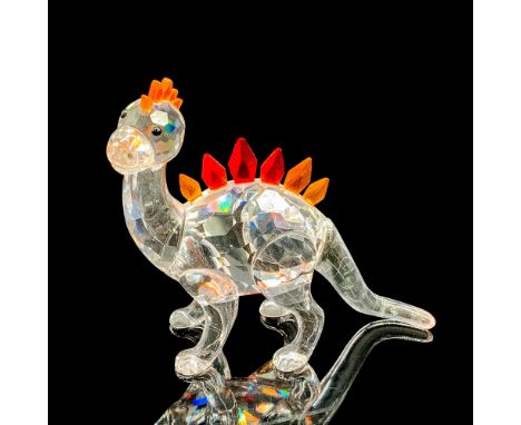 This retired dinosaur called Dino has a clear faceted crystal body and his comb and plates are in color crystal ranging from 