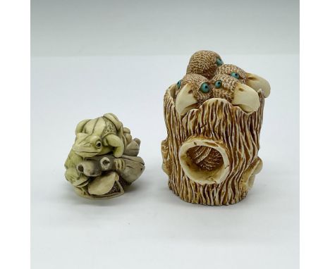 Two treasure boxes crafted from resin and crushed marble. One depicting baby birds in the trunk of a tree, measures 2"L x 2"W