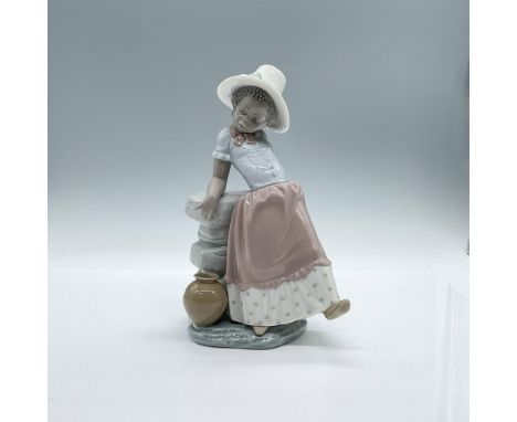 Contemplating the day, this girl is adorable. Glossy finish. Lladro backstamp. Artist: Jose RoigIssued: 1982-1998Dimensions: 