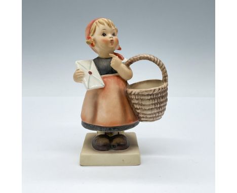 Hand painted figure of a young girl holding a basket and a letter. Goebel backstamp TMK3. Issued: 1960-1972Dimensions: 3.5"L 