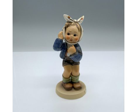 Hand-painted figurine depicting a boy with a bandage around his head holding his cheek. Goebel backstamp on the bottom. Dimen