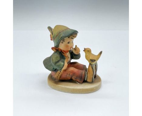 Hand painted porcelain figurine depicting a Bavarian boy with bird. Goebel TMK 3. Issued: 1960-1972Dimensions: 3"L x 1.75"W x