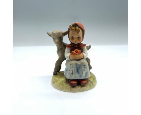 Hand-painted figurine depicting a young girl with a lamb holding flowers. Goebel backstamp on the bottom. Artist: Arthur Moel