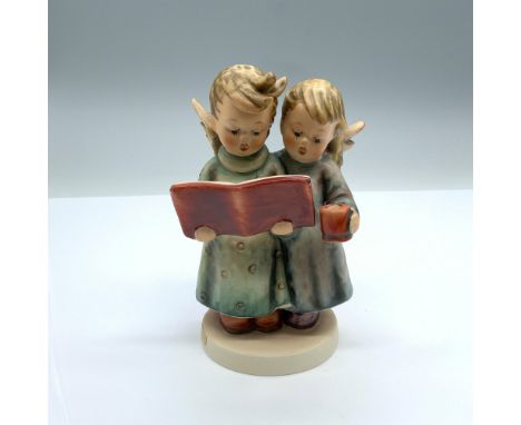 Hand-painted figurine depicting two angels singing. Goebel backstamp on the bottom. Dimensions: 3"L x 2.75"W x 5.25"HManufact