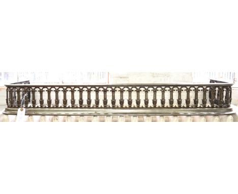 A BURNISHED STEEL FENDER IN VICTORIAN STYLE, 106CM W 