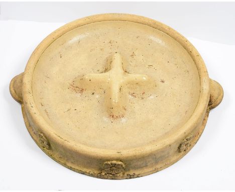 A VICTORIAN GLAZED BUFF STONEWARE POULTRY FEEDER BY J. CARTER &amp; CO (SEEDMEN TO H. R. THE KING, LONDON), THE SIDES MOULDED